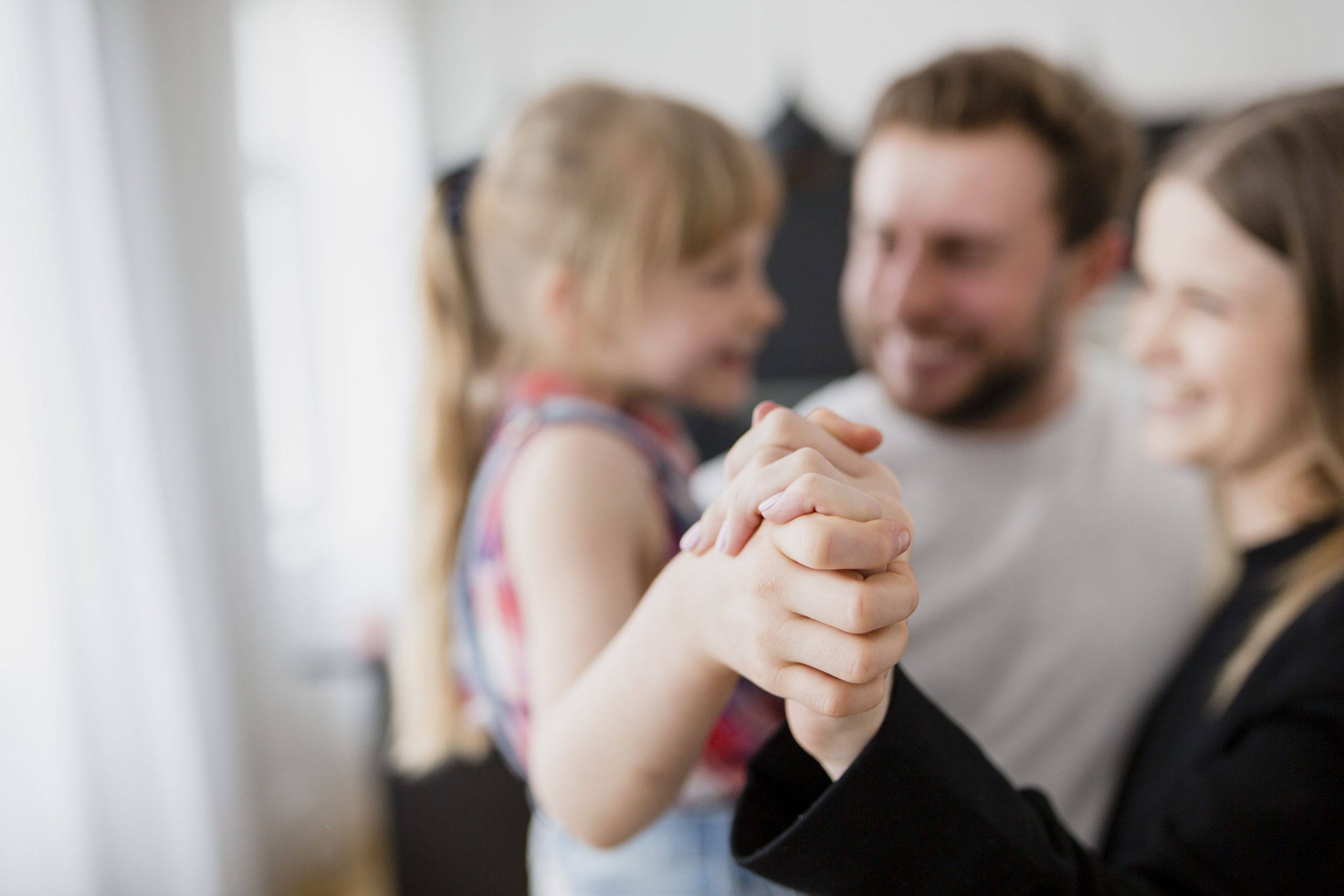 blurred-family-hugging-each-other